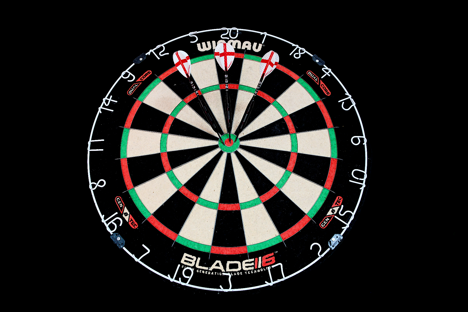 Darts and a scoreboard by the oche, ready for the evening's play.